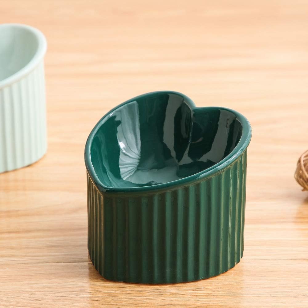 HCHLQLZ ceramic cat bowl shown holding cat food.