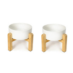 HCHLQLZ raised dog bowl set shown from the front with white ceramic bowls and a bamboo stand.
