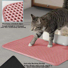 HCY&WLD cat litter mat holding collected litter between its layers.