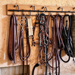 HDYEGY tack rack shown in use in a stable setting.