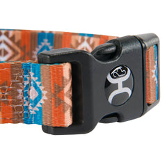 HOOEY Nomad dog collar close-up showing the plastic side-release buckle and Hooey emblem.