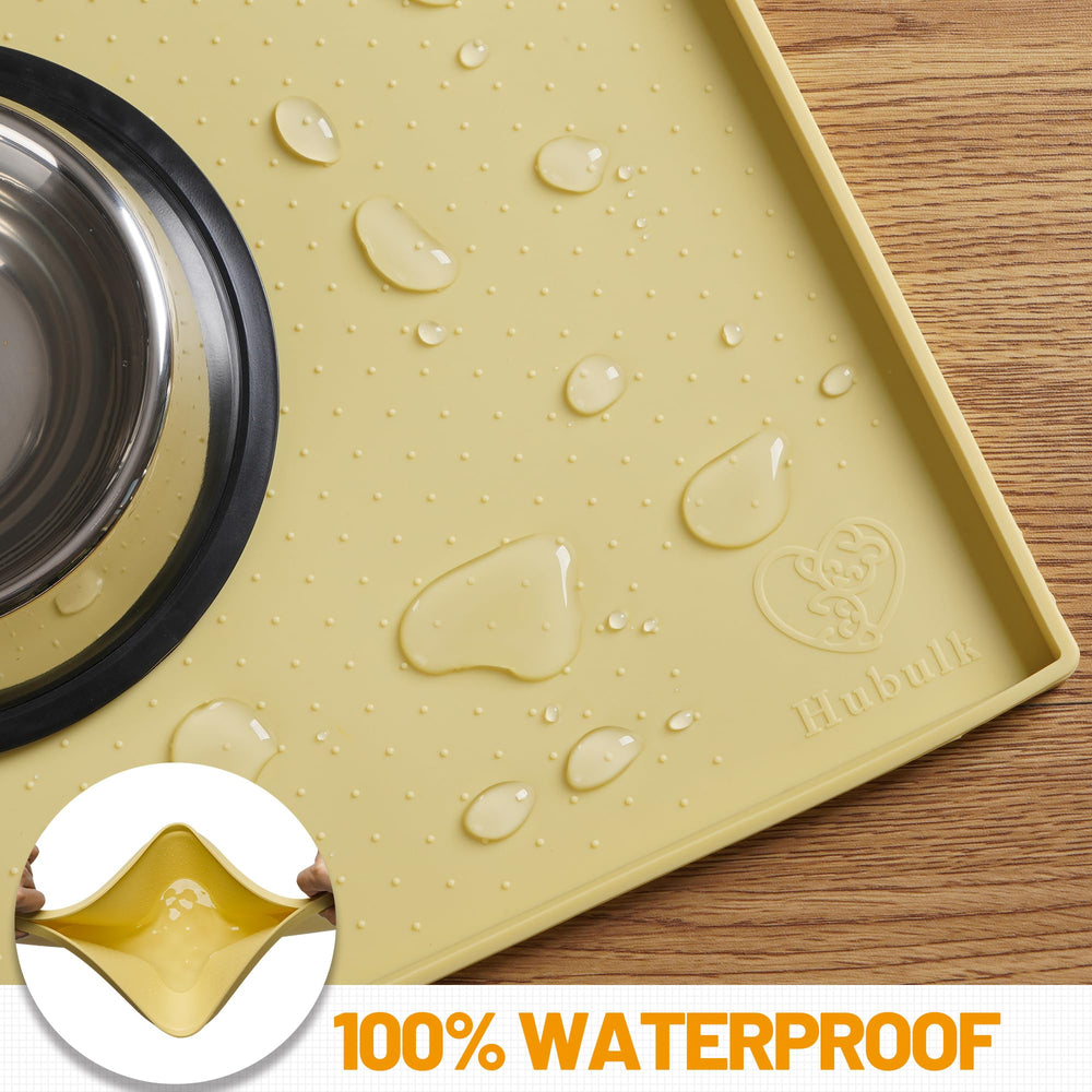 Hubulk Dog Feeding Mat placed beneath pet food and water bowls.