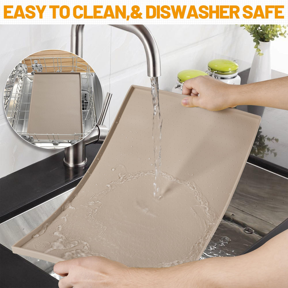 Hubulk dog feeding mat being rinsed clean at a sink.