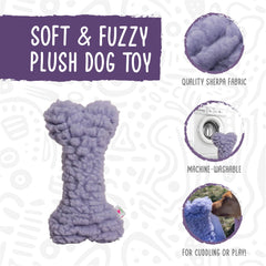 HuggleHounds Plush Bone Dog Toy being cuddled by a dog.