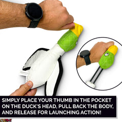 Hyper Pet Flying Duck dog toy head with its thumb pocket in focus.