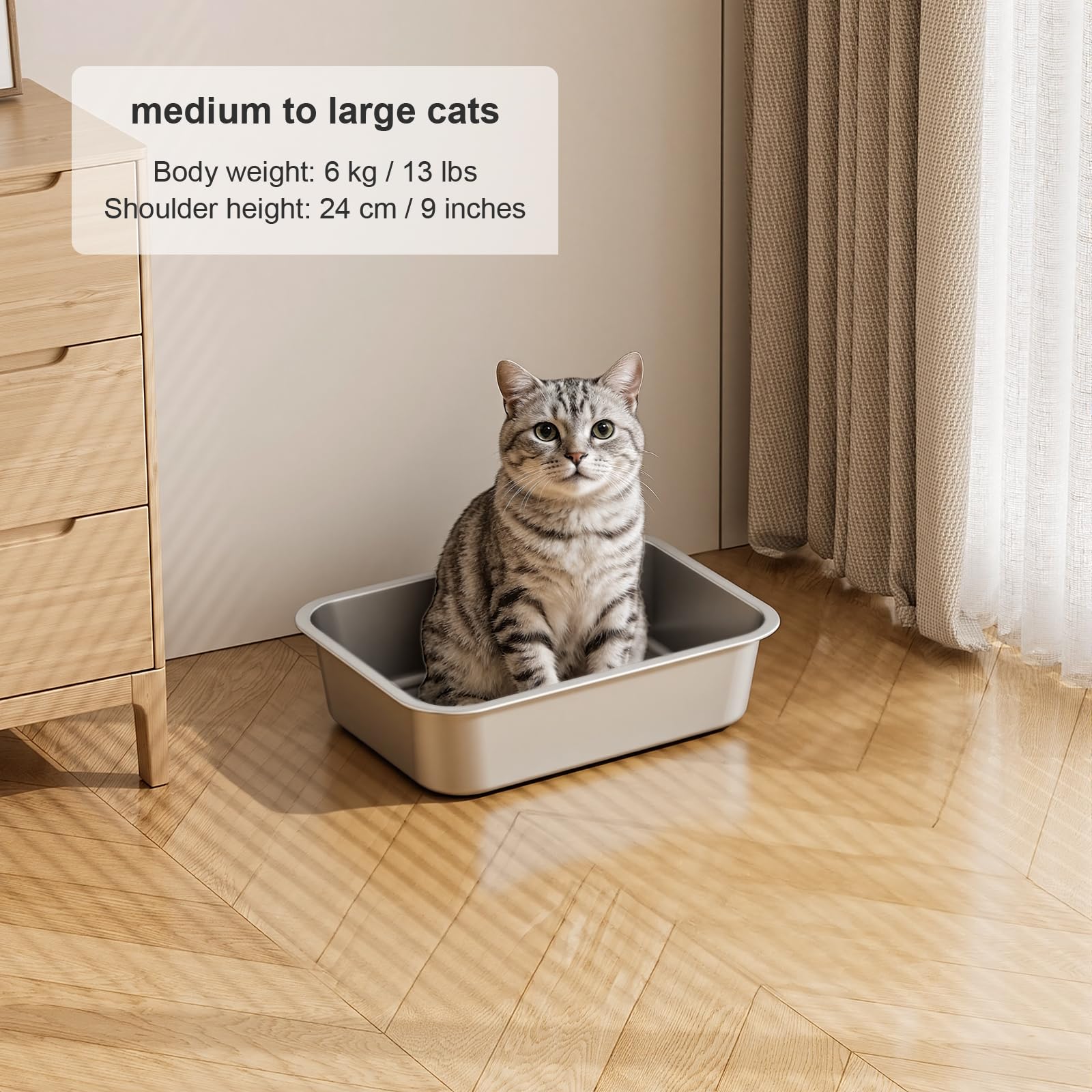 Idymere small stainless steel cat litter box being cleaned across its smooth interior.