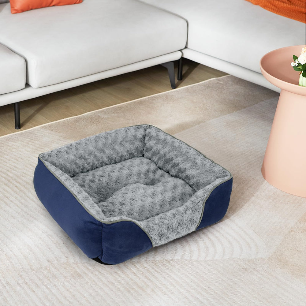 INVENHO dog bed with a dog resting on its soft cushioned surface.