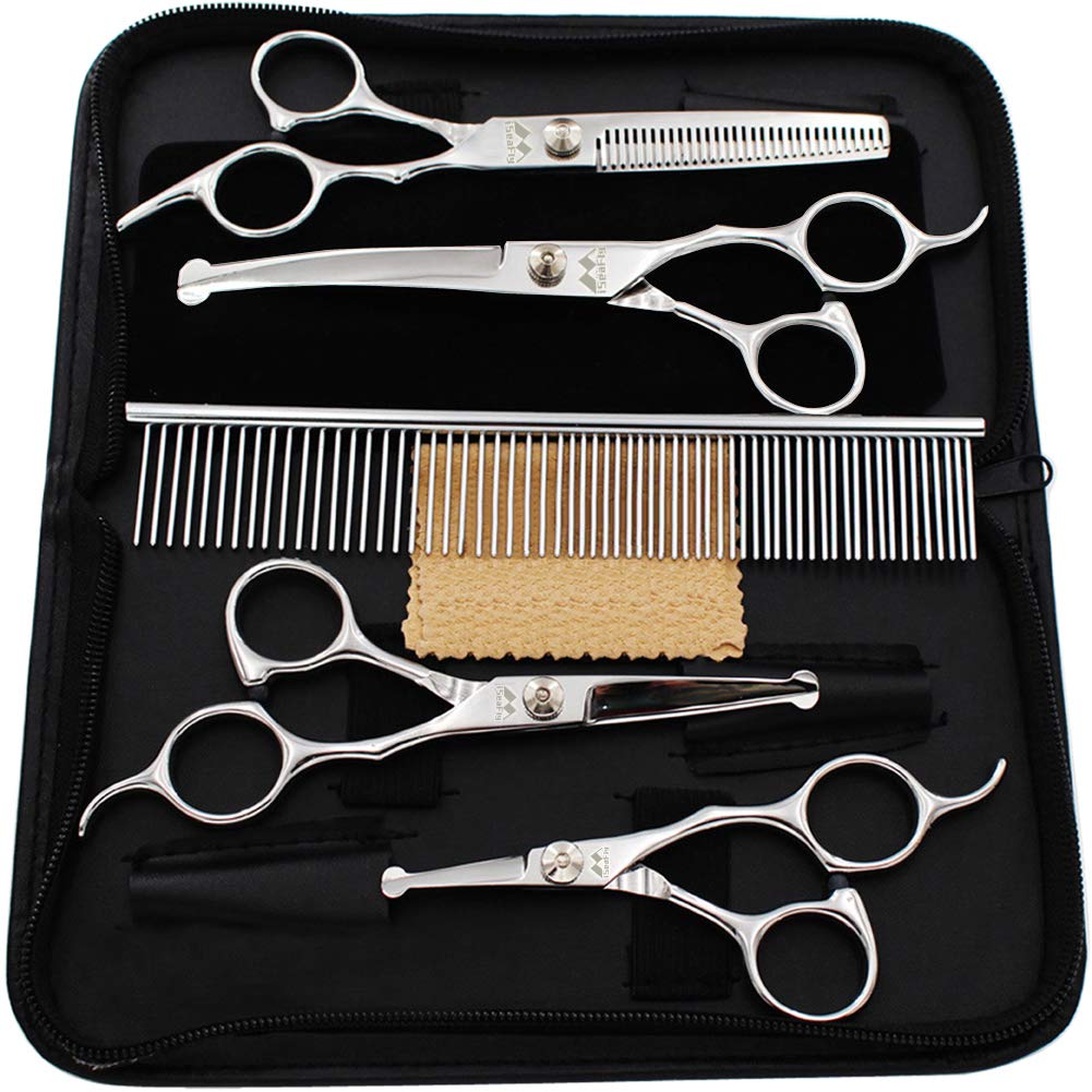iSeaFly grooming scissors kit showing the four shears, pet comb, cleaning cloth and black leather case.