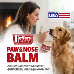 Jeffers Paw & Nose Balm being applied to a dog's paw pad.