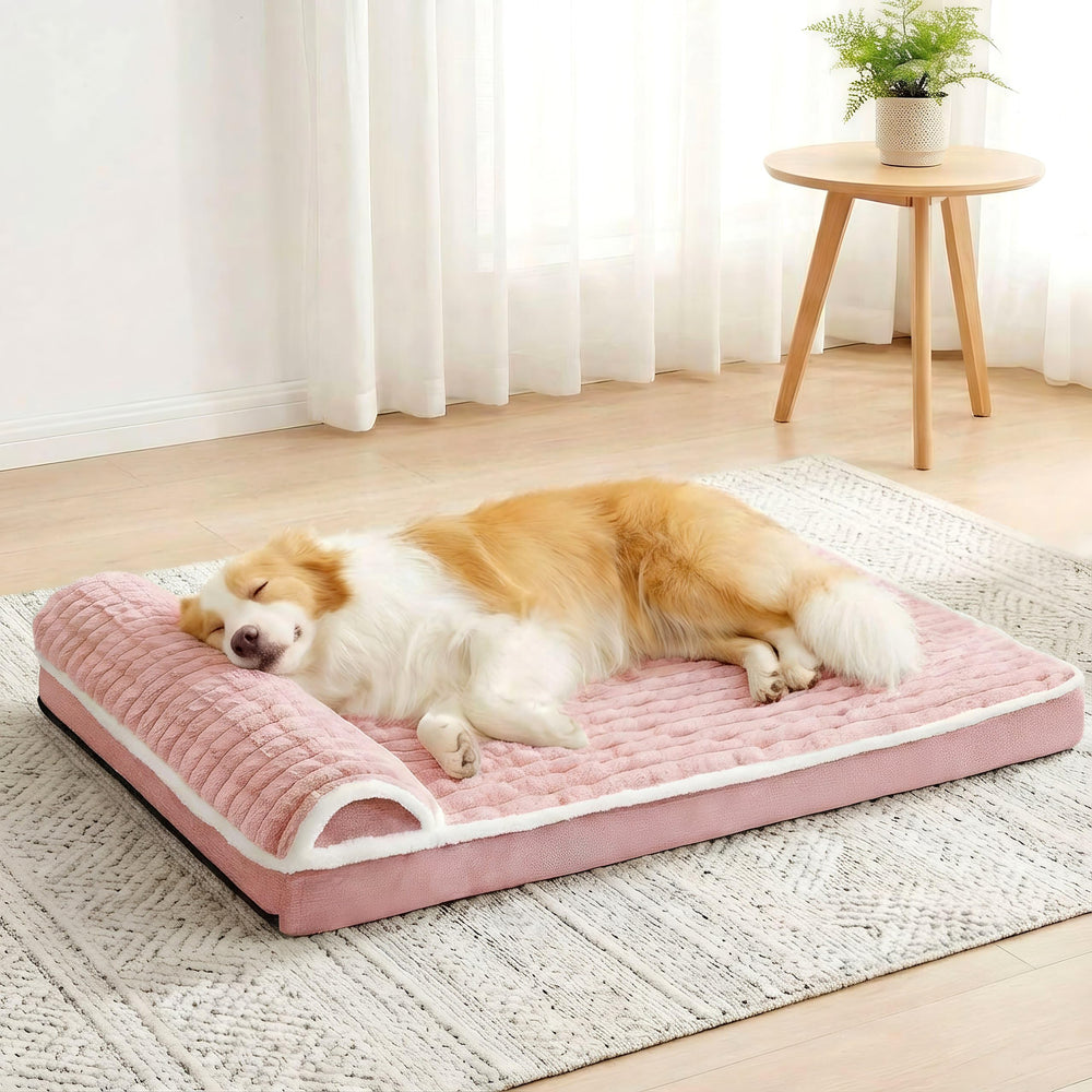 Jolifield dog bed shown in a full view with its pink pillow shape.