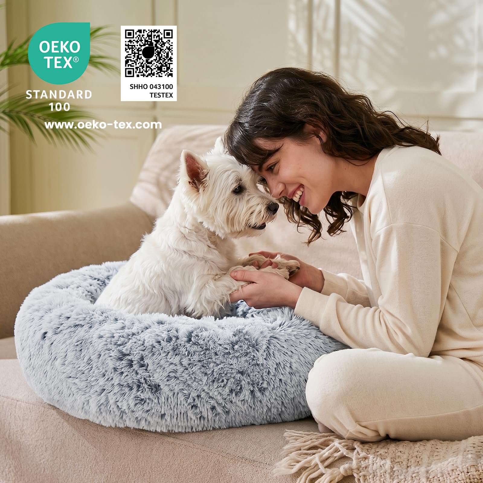 JOLLYVOGUE dog bed shown with a pet curled up inside the raised border.