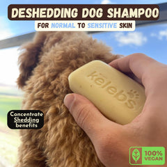 KELEBS dog shampoo bar being rubbed over a wet dog’s coat.