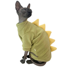 Kitipcoo cat sweater shown from the front with its green dinosaur design.