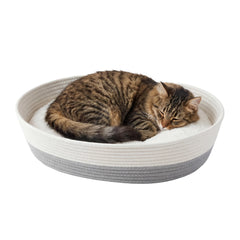 Kitty City woven cat bed shown from the front in white and grey.