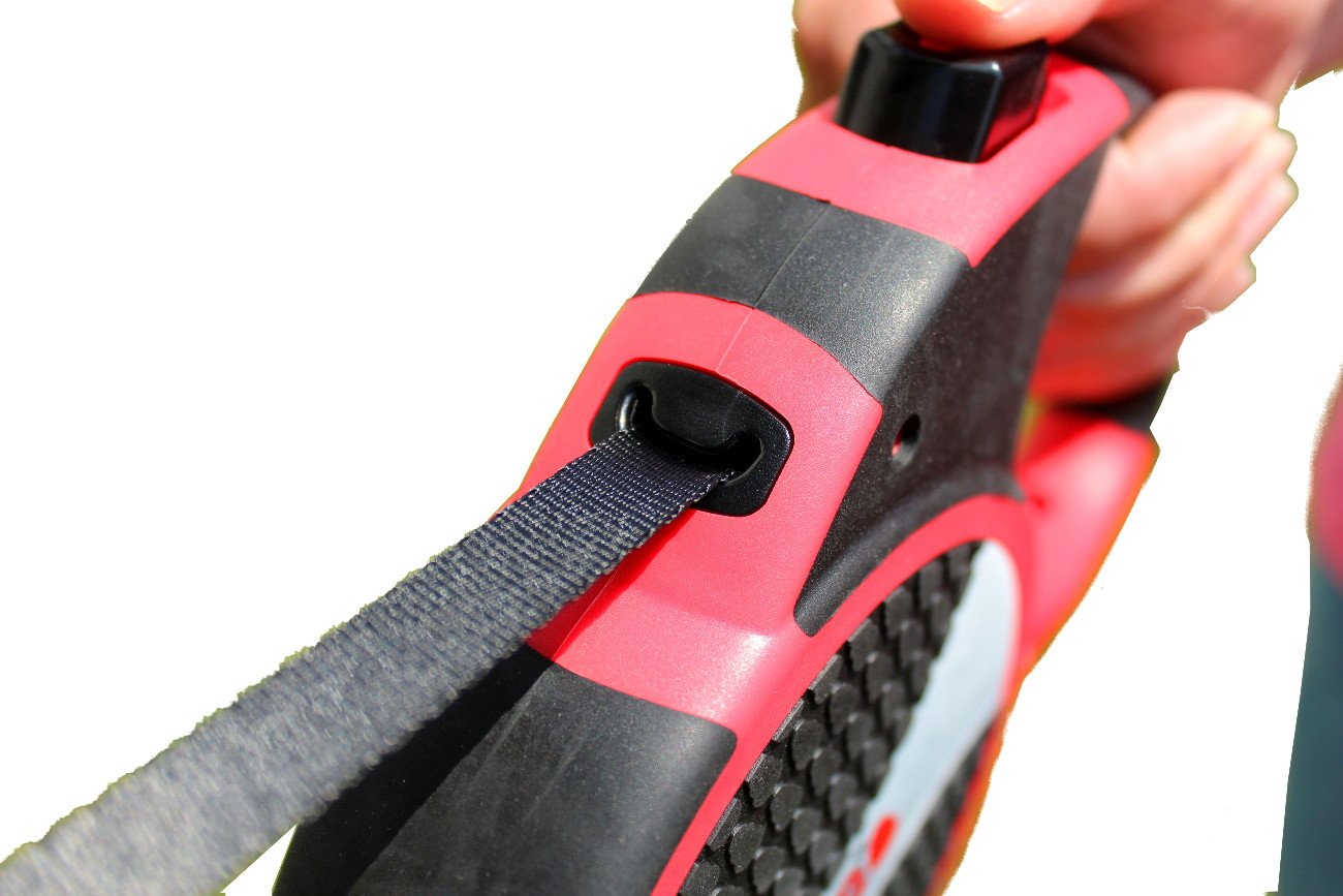 KONG Terrain retractable dog leash shown with its belt extended.