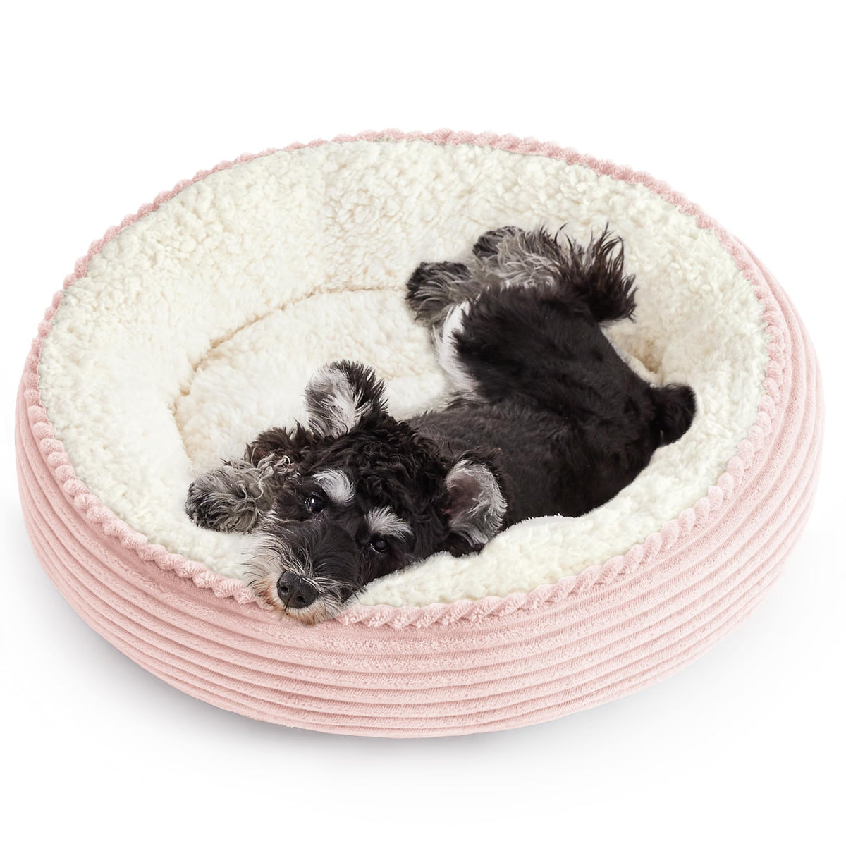 Love's cabin donut pet bed shown from the front in light pink.
