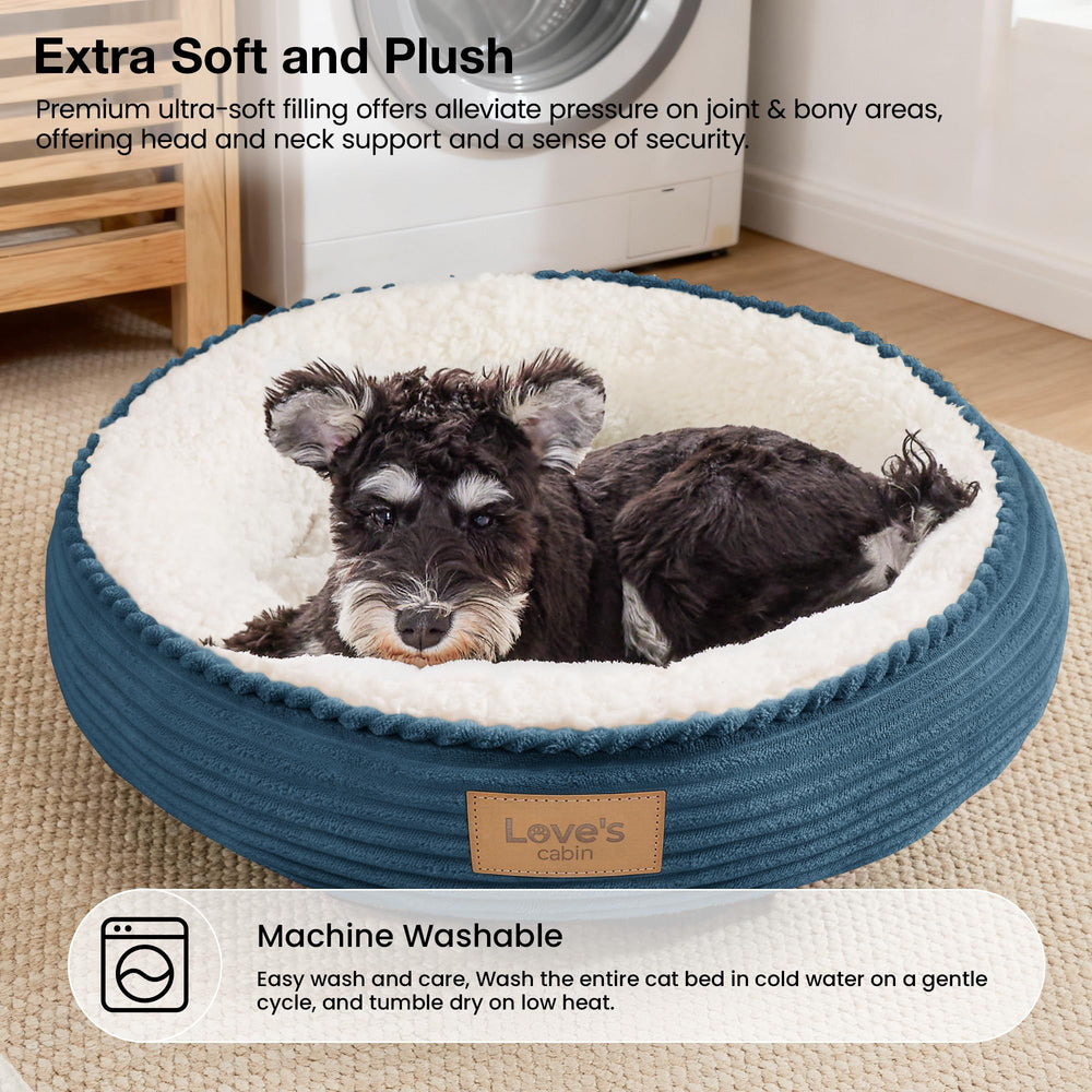 Love's cabin pet bed shown in use as a crate pad.