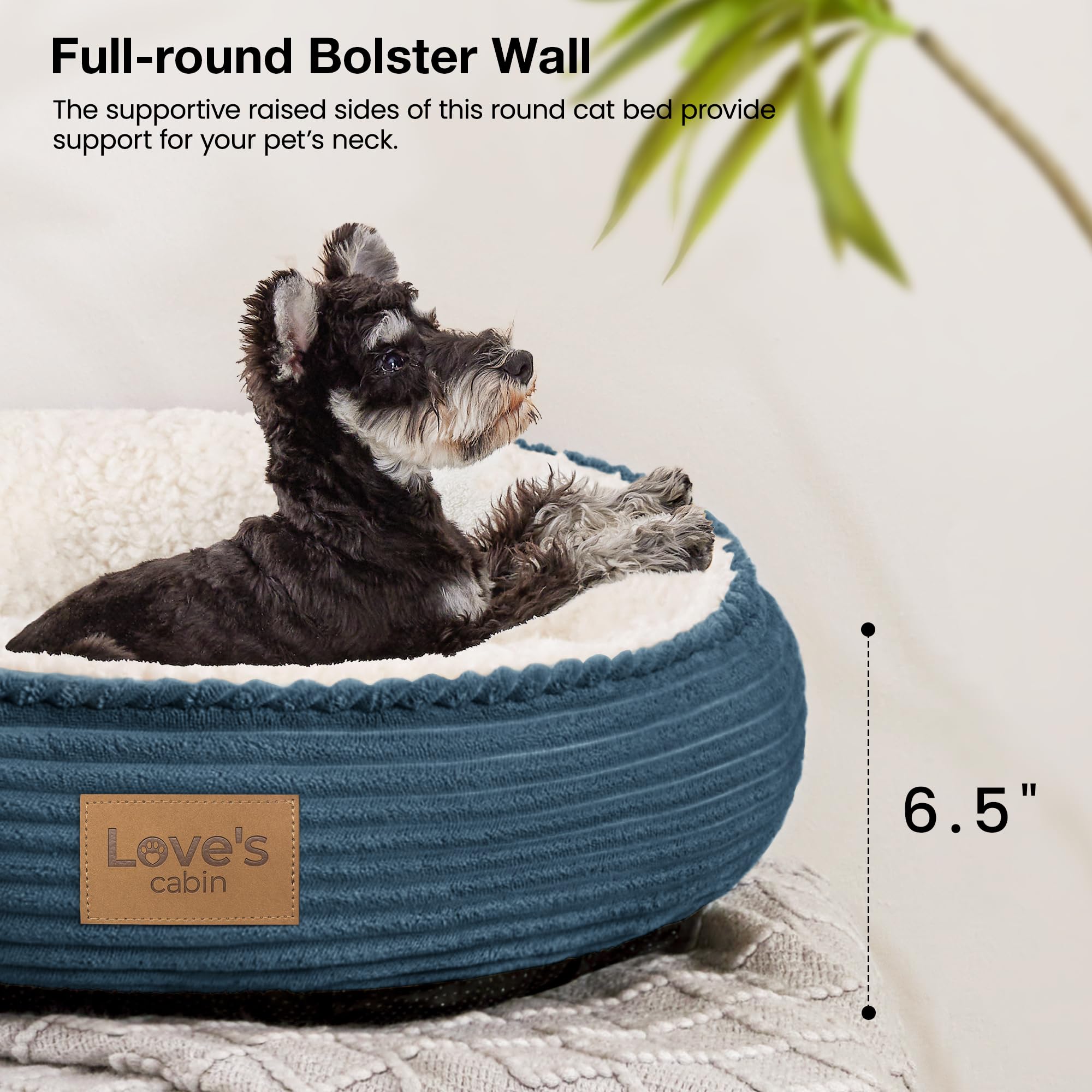 Love's cabin pet bed underside showing the slip-resistant oxford bottom.