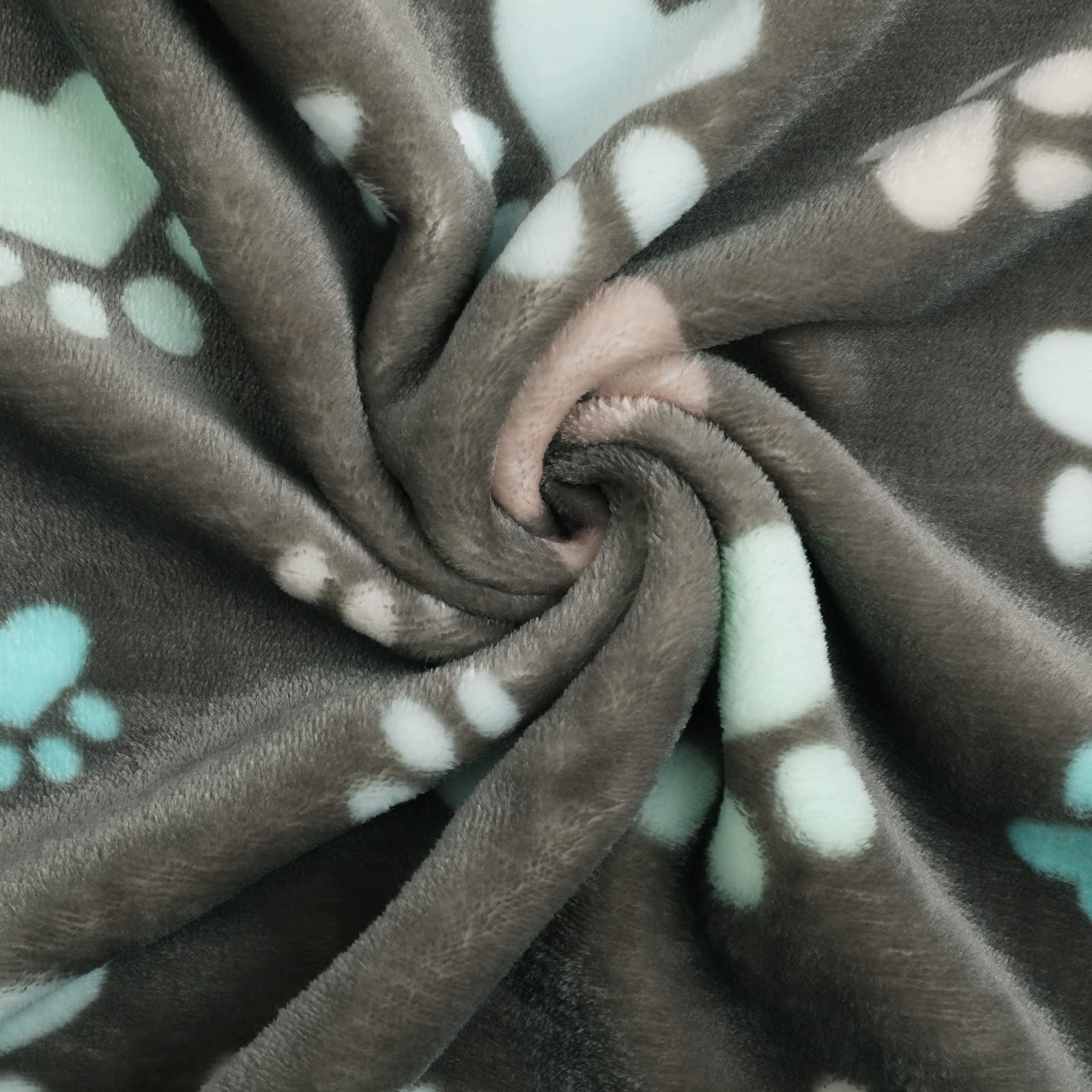Luciphia pet blanket shown providing a resting spot for a cat.