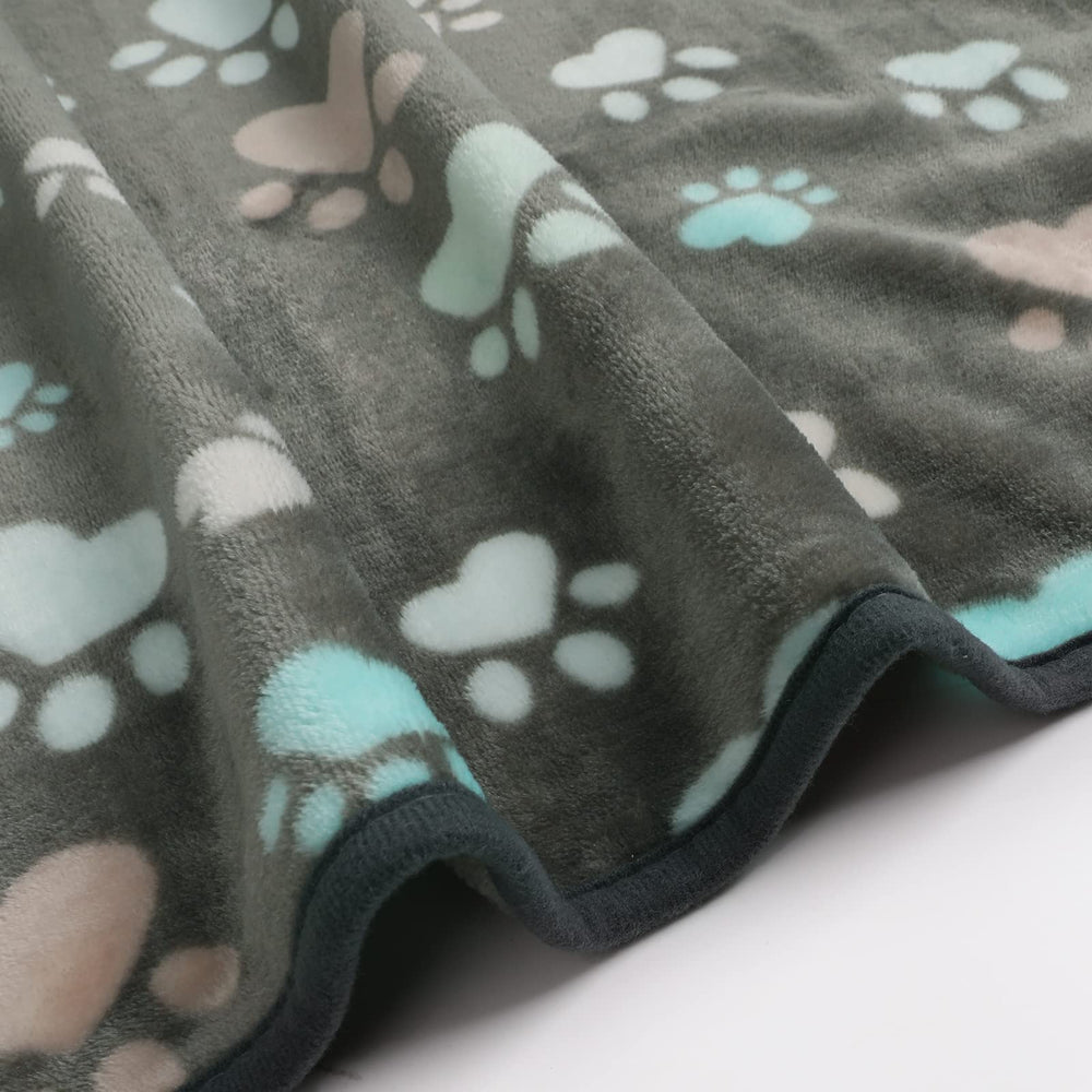 Luciphia pet blanket laid over a sofa to help protect the furniture.