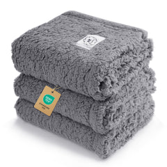 Luciphia pet blankets shown from the front in grey with a paw-print design.
