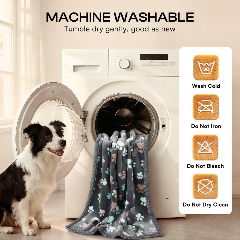 Luciphia waterproof dog blanket placed on a bed.