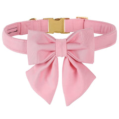 M MACA BATES dog collar shown from the front with its nude pink color and sailor bow.