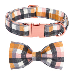 M MACA BATES dog collar shown from the front with its autumn check pattern and matching bow tie.