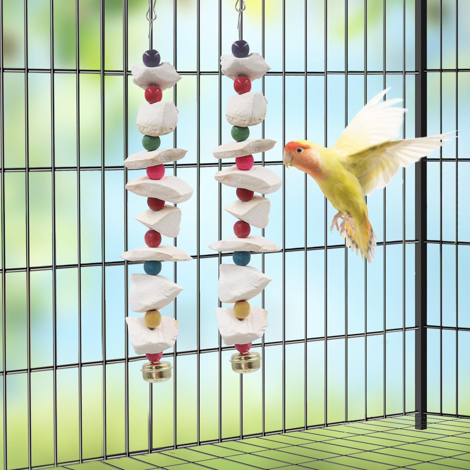 MHLLGN bird toys attached inside a birdcage.