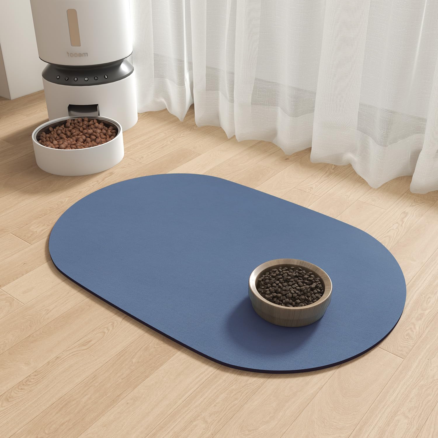 MontVoo dog food mat shown in blue from the front.