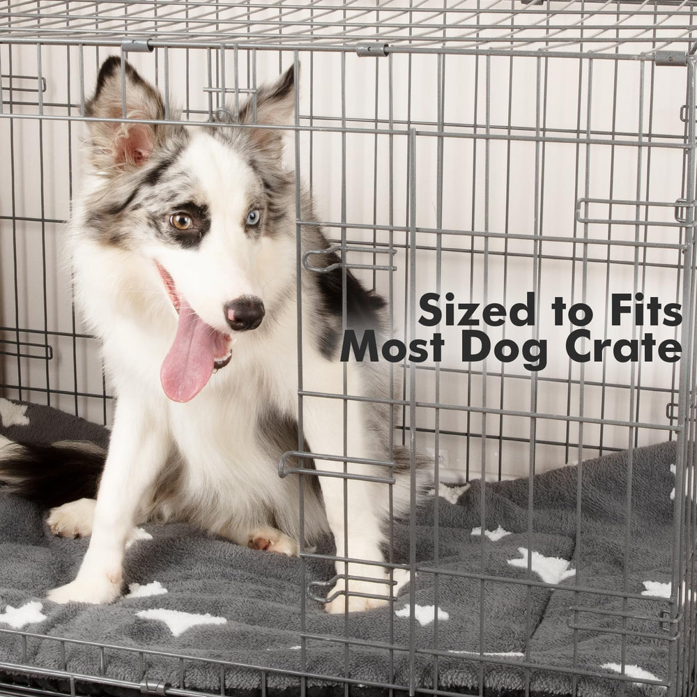Mora Pets dog crate pad shown with a pet resting on its cushioned surface.