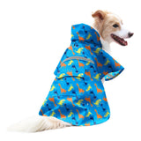 NACOCO dog raincoat shown from the front in blue with a dinosaur design.