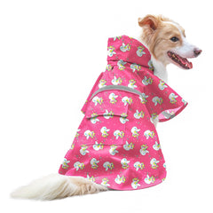 NACOCO dog raincoat shown from the front in pink with a unicorn design.