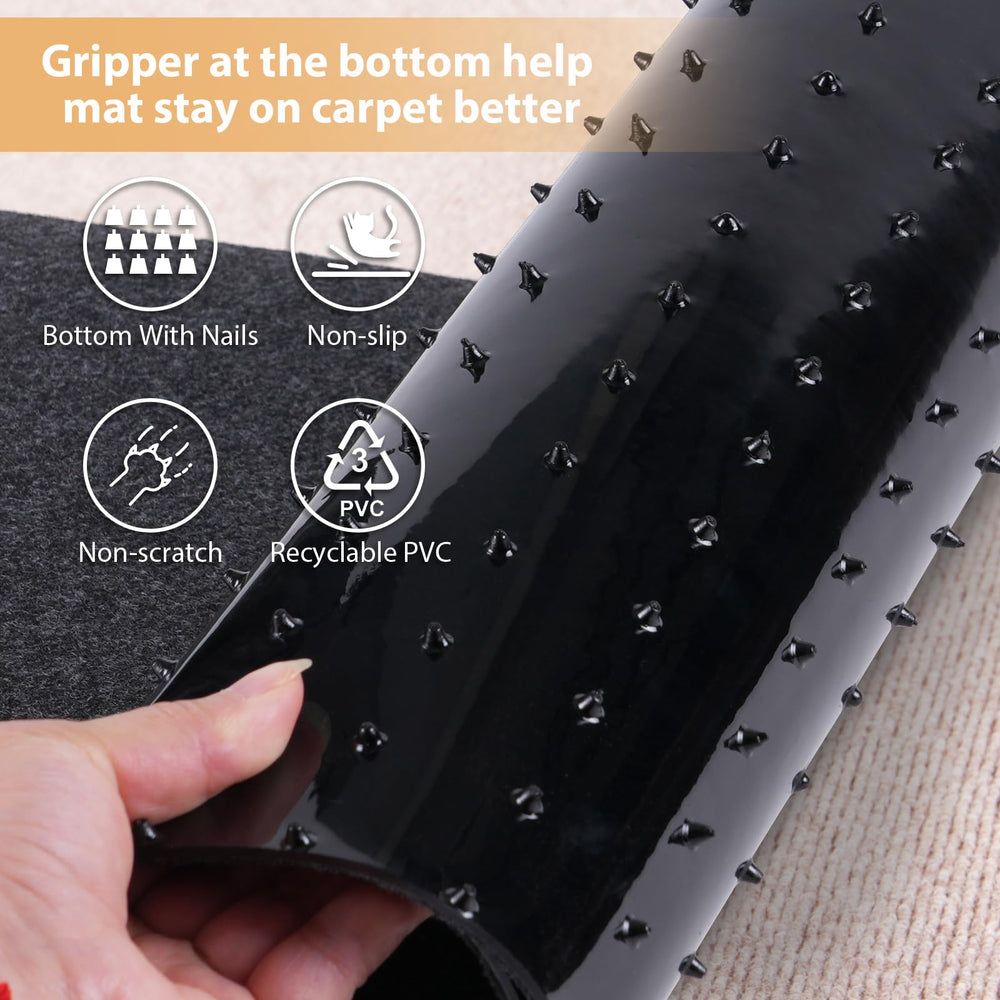 Oroonoko Carpet Protector for Pets positioned across a doorway carpet.
