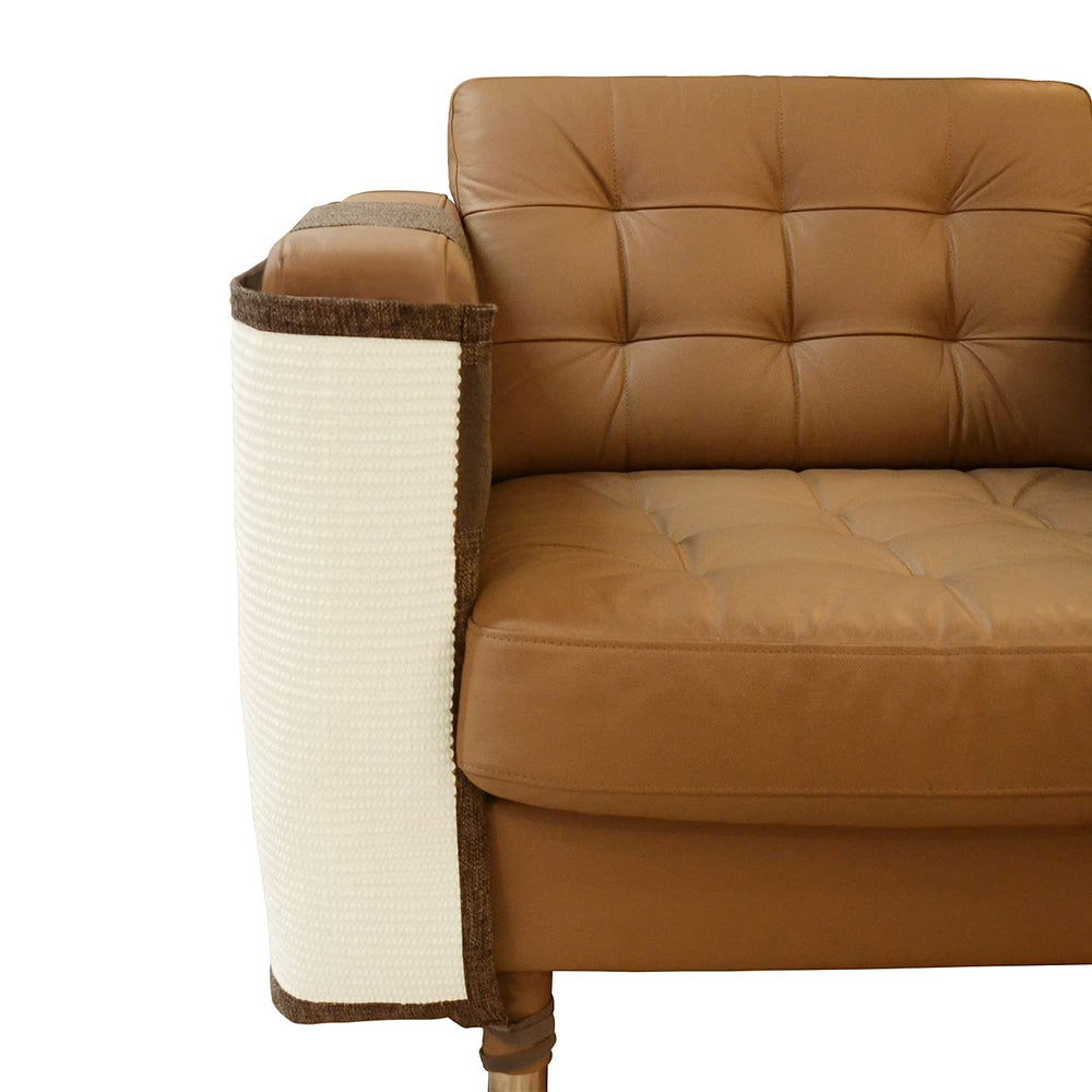 Oroonoko Cat Scratch Furniture Protector positioned on the right side of a sofa.