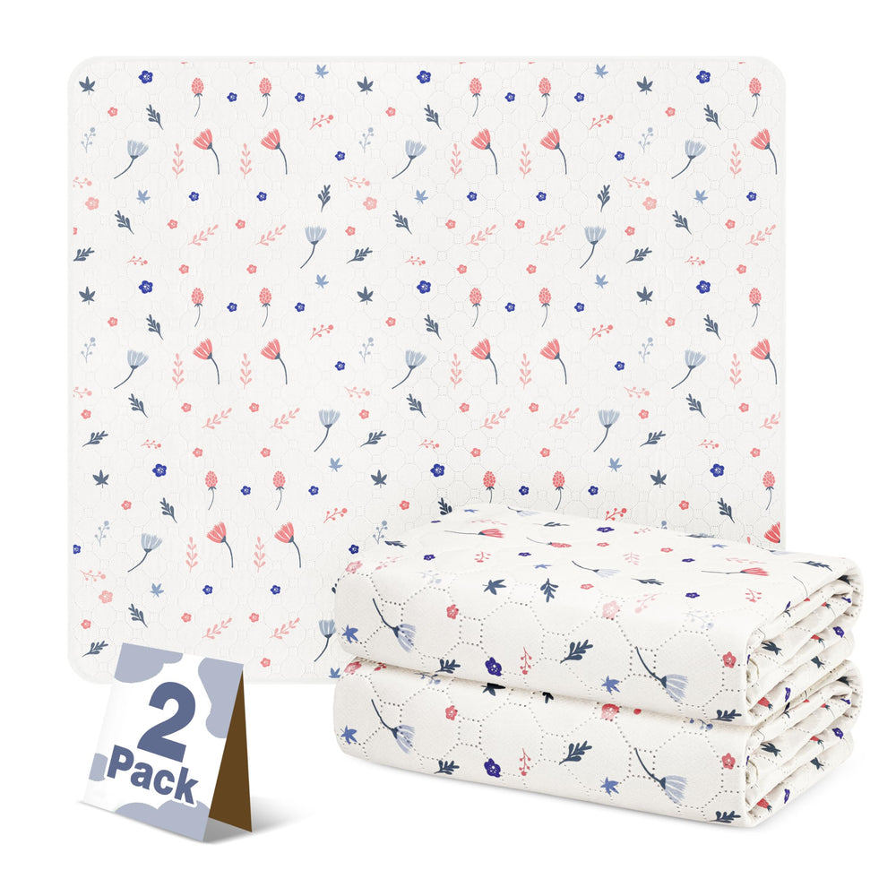Oslianbok reusable dog pee pads shown together in the pinkish-white leaf pattern.