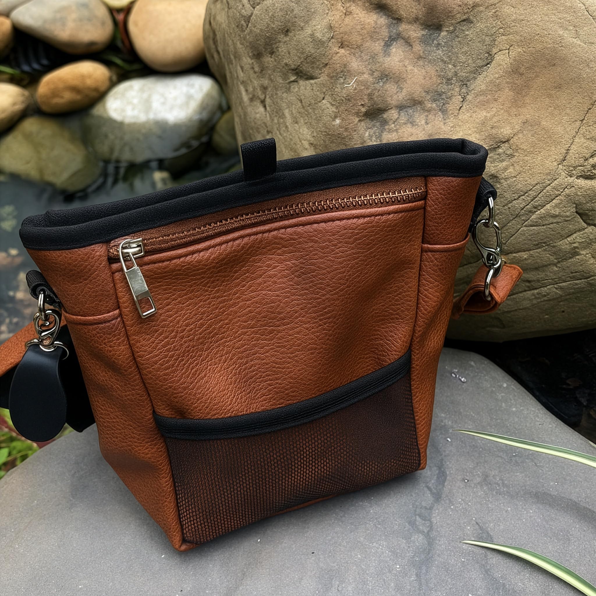 OtterPets dog treat pouch water-resistant PU leather surface shown close-up.