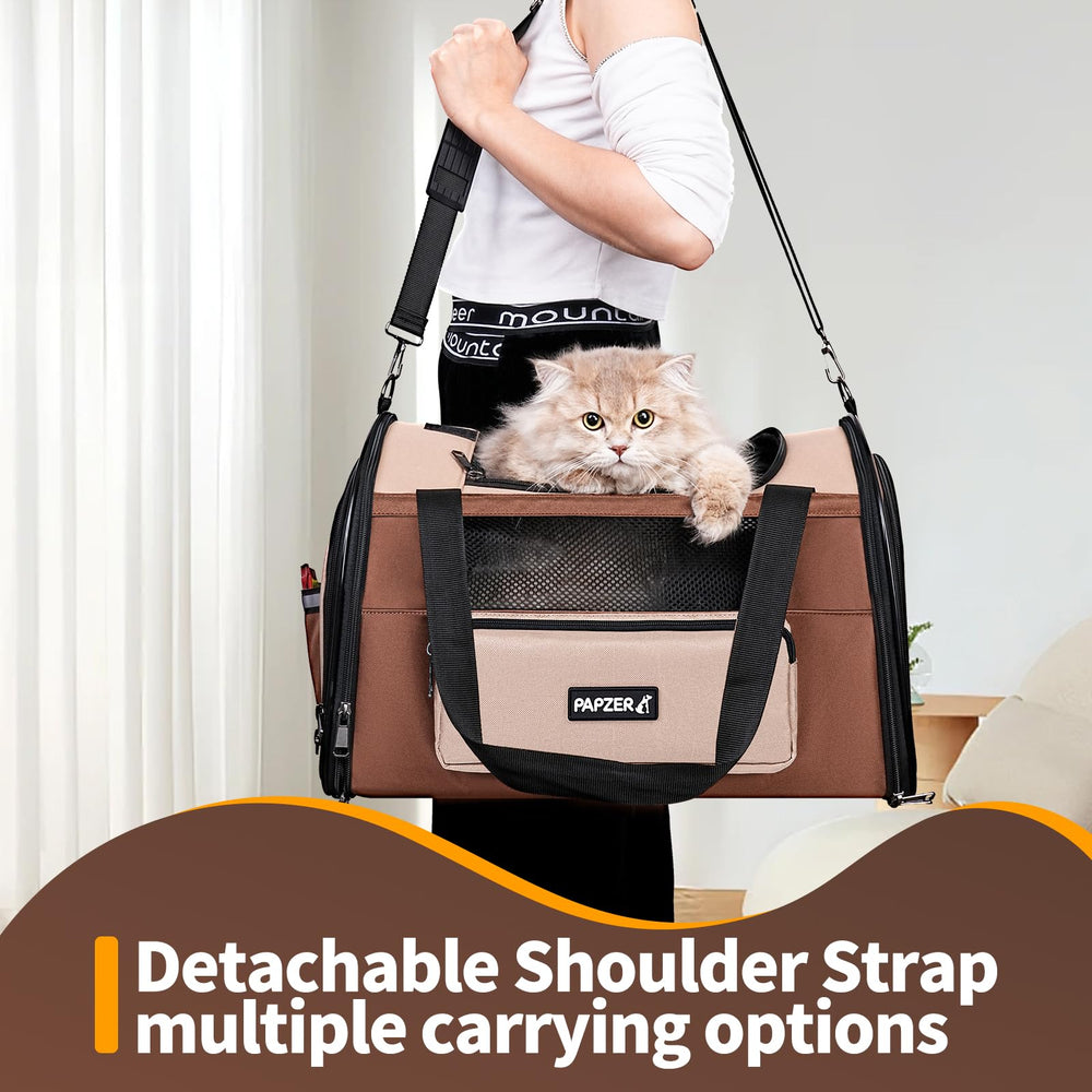 PAPZER small pet carrier shown with its adjustable shoulder strap.