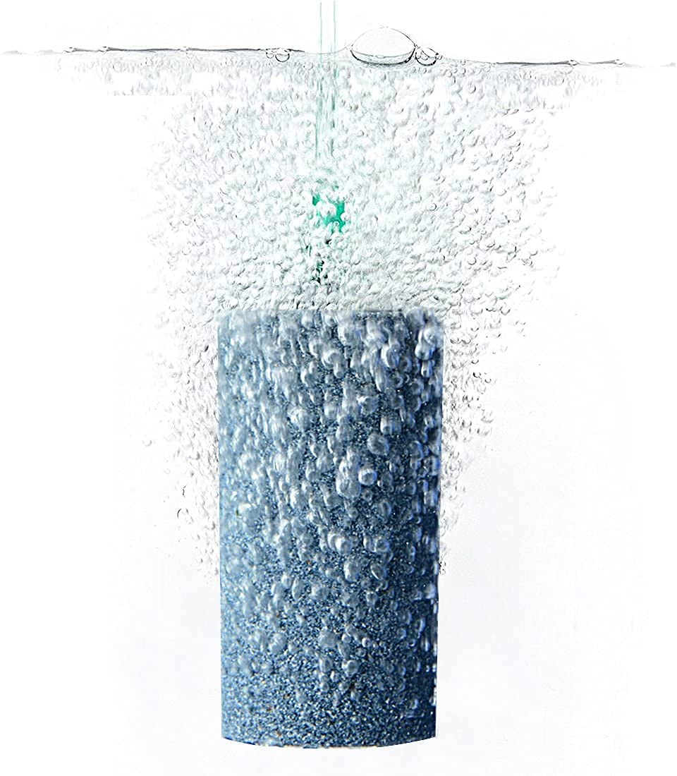 Pawfly Aquarium Air Stone Cylinder bubbling in an outdoor garden pond.