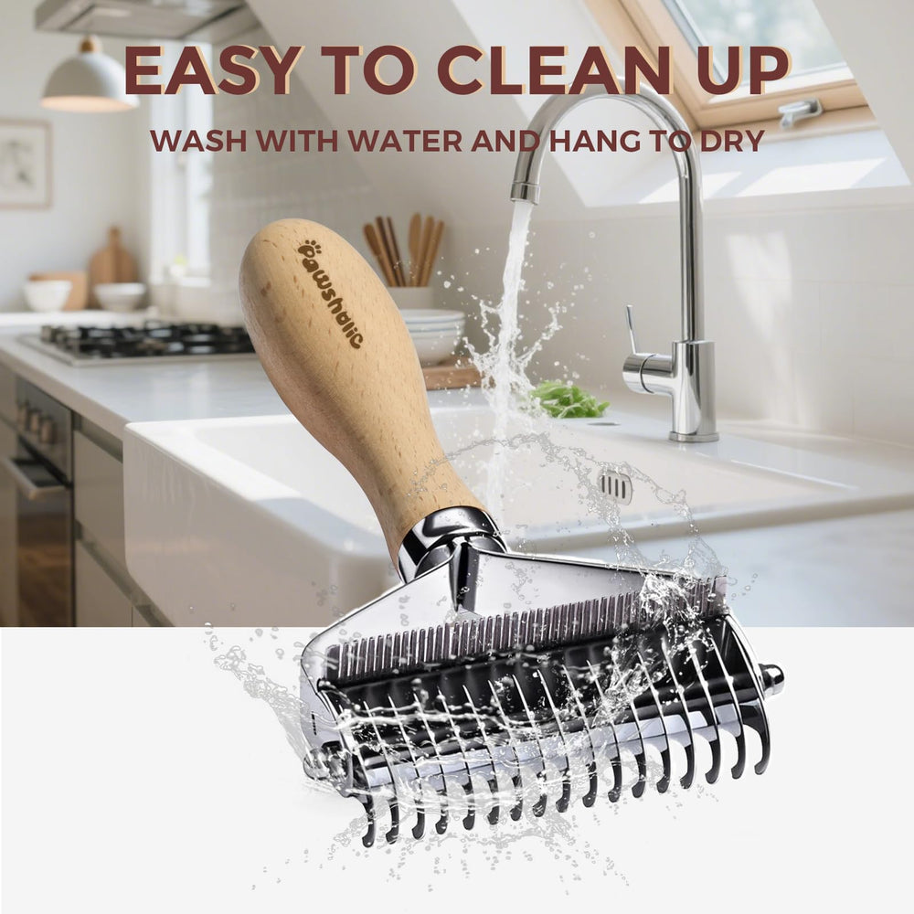 PAWSHOLIC undercoat rake with its natural wooden handle in focus.