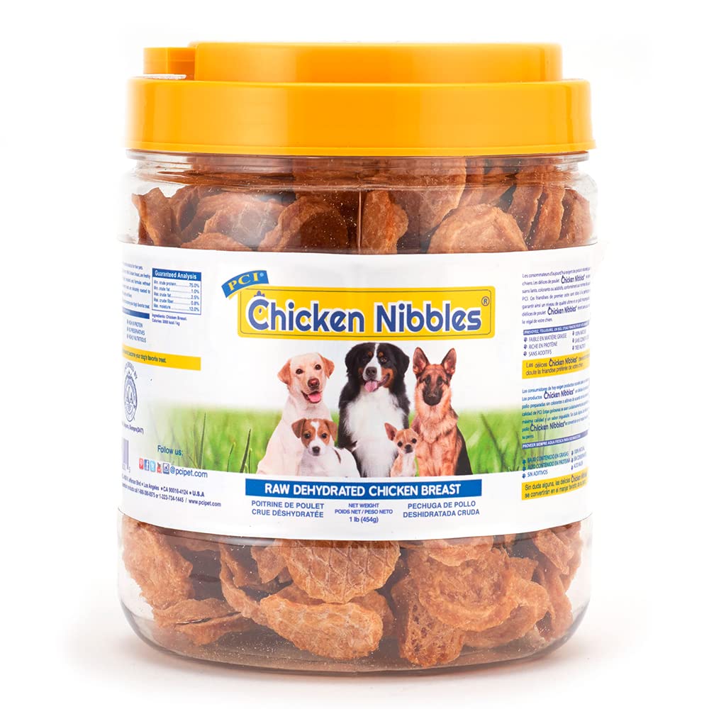 PCI Chicken Nibbles dog treats shown from the front of the container.