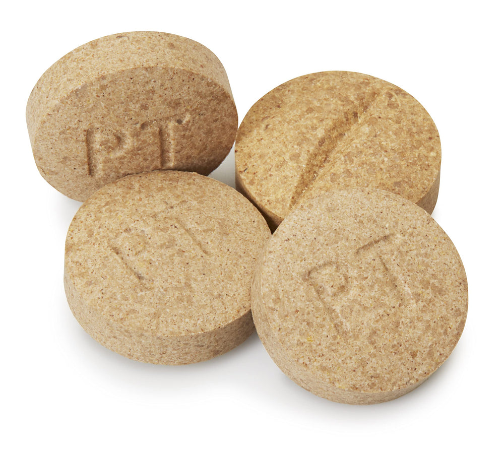 Pet-Tabs dog multivitamin chewable tablets shown in a close-up view.