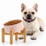Petygooing ceramic pet bowl shown from the front with its bamboo stand.
