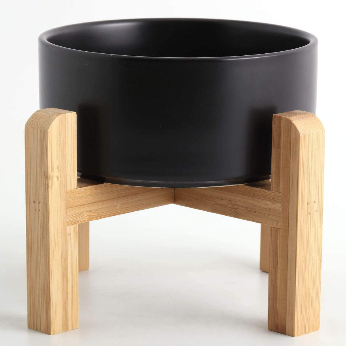 Petygooing raised dog bowl shown from the front with its bamboo stand.
