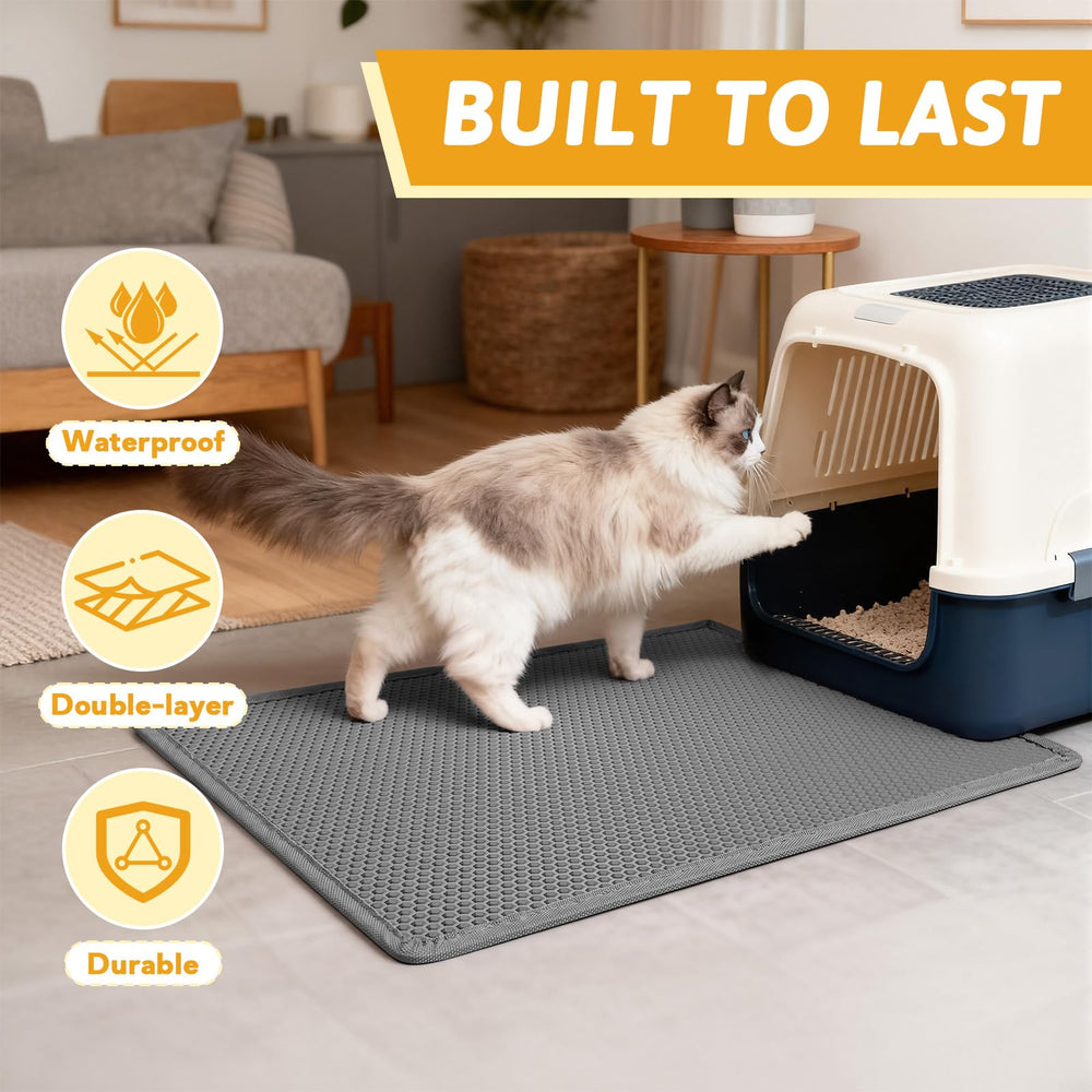 Pieviev litter box mat being rinsed clean with water.