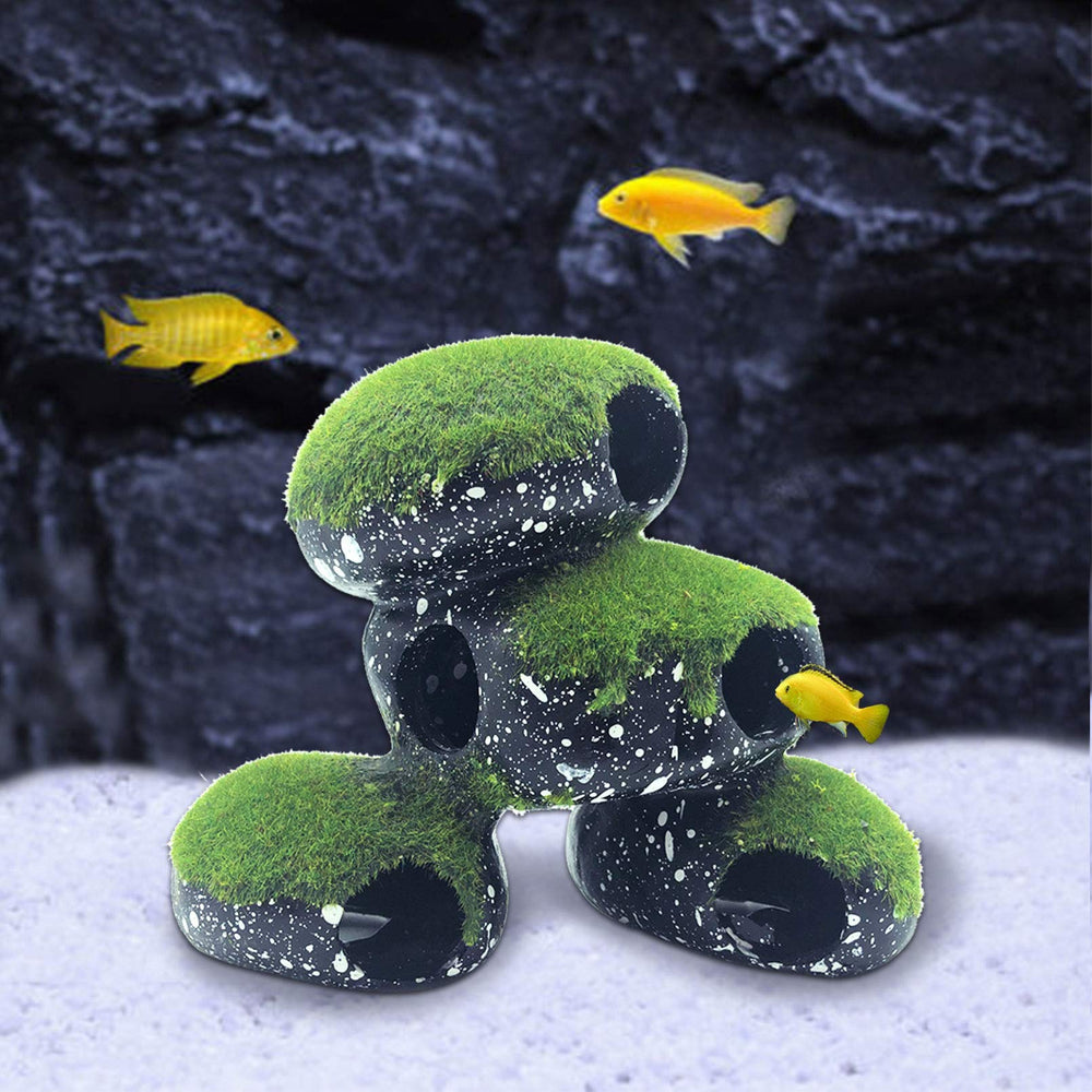 PINVNBY Stone Aquarium Hideaway being wiped and rinsed with warm water for cleaning.