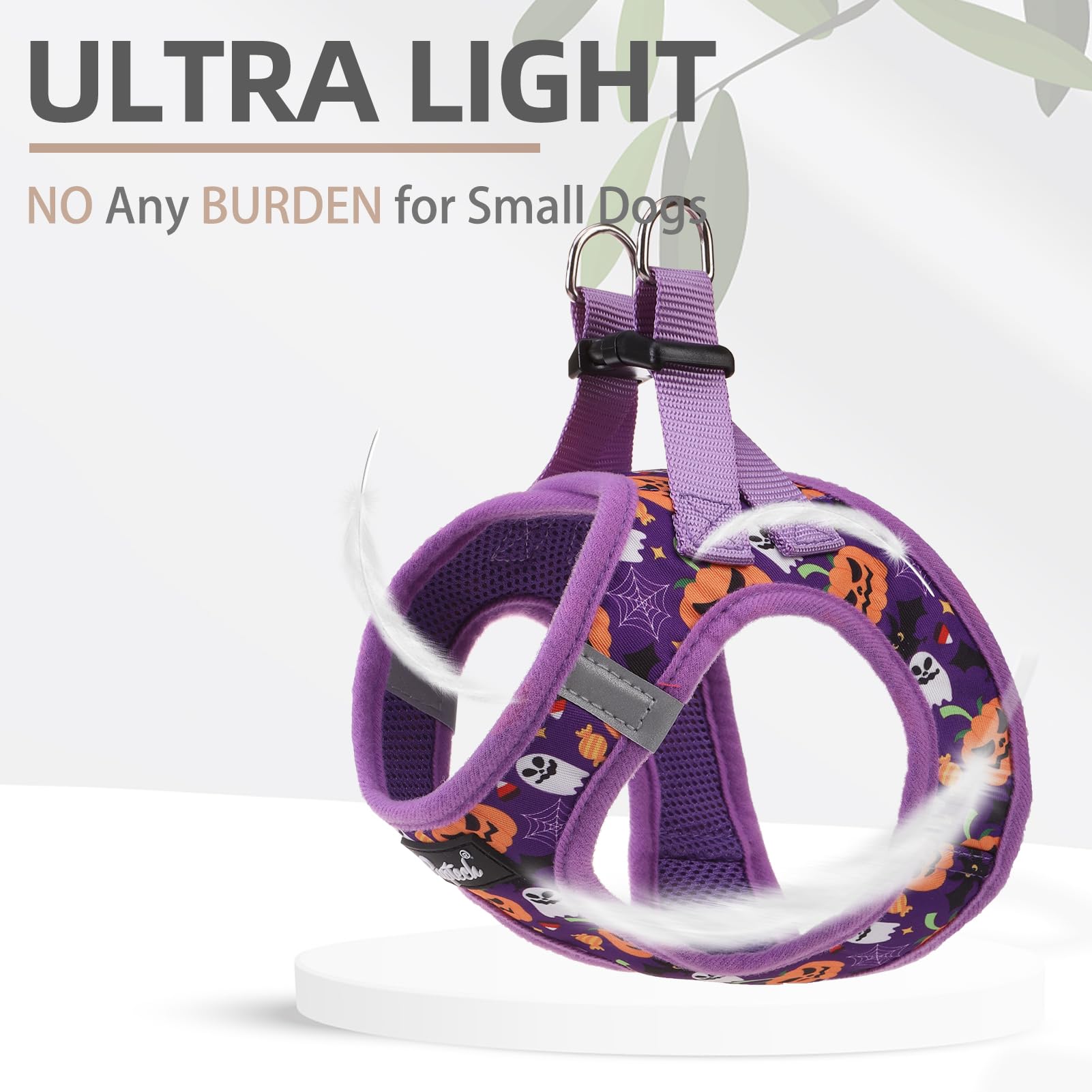 PUPTECK dog harness detail showing its metal D-rings and quick-release buckle.