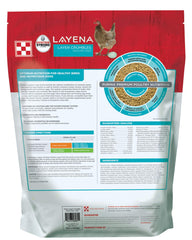 Purina Layena layer hen feed shown being offered to a hen.