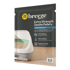Purina Tidy Cats Breeze Extra Strength Zeolite Pellets shown being poured from the bag.