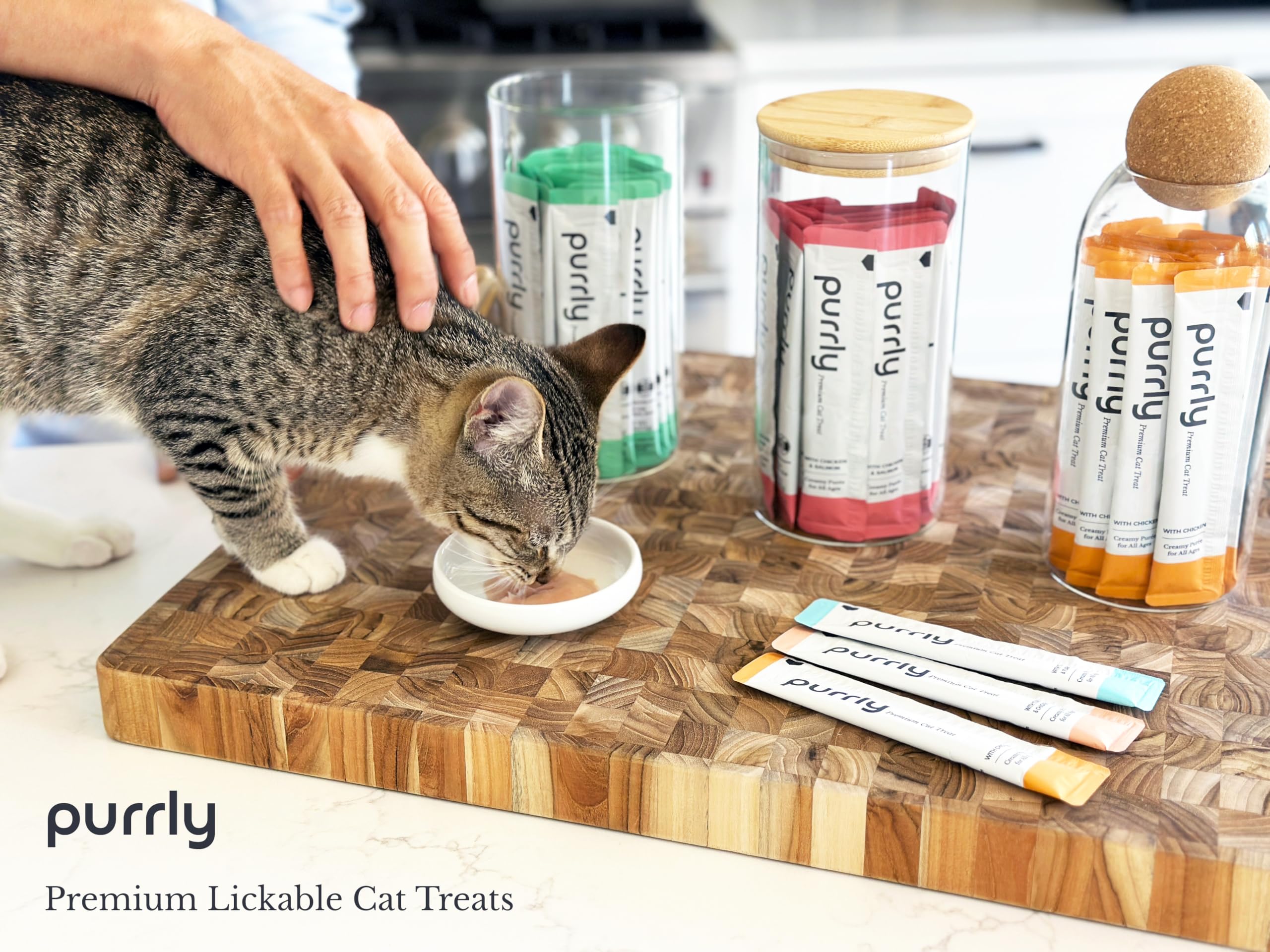 Purrly lickable cat treats served on a spoon.